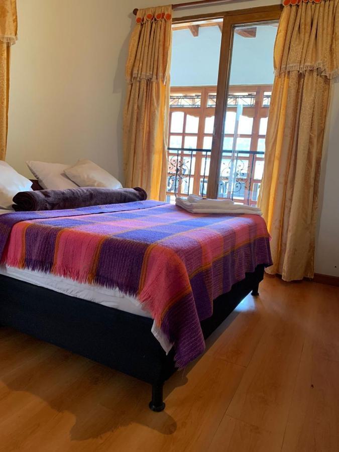 Casa Pastora Coworking Panzió Guatapé Szoba fotó